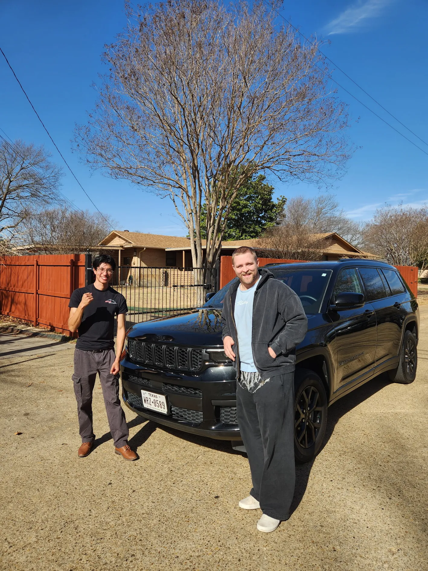 Marcus with their Jeep Grand Cherokee after PDR service in Dallas, TX