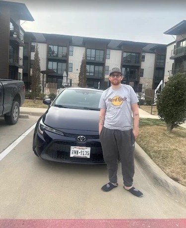 Ryan T. with their Toyota Corolla after PDR service in Fort Worth, TX