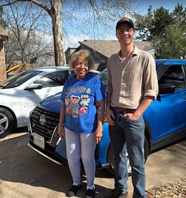 Linda with their Nissan Sentra after PDR service in Arlington, TX